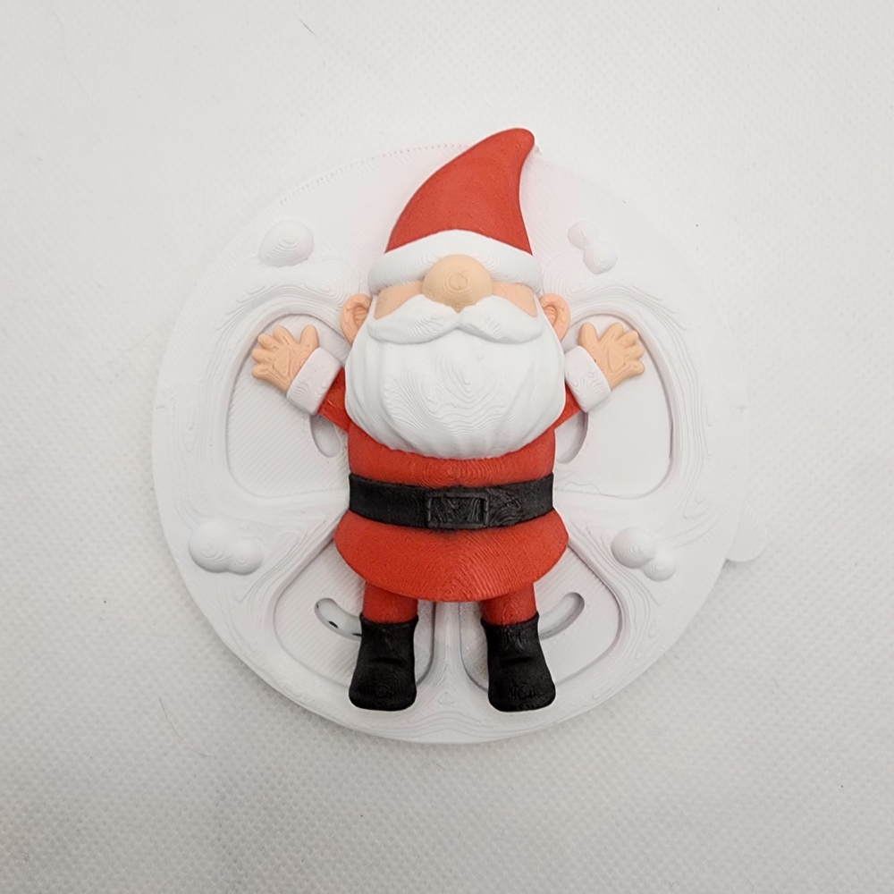 Santa Working On A Snow Angel